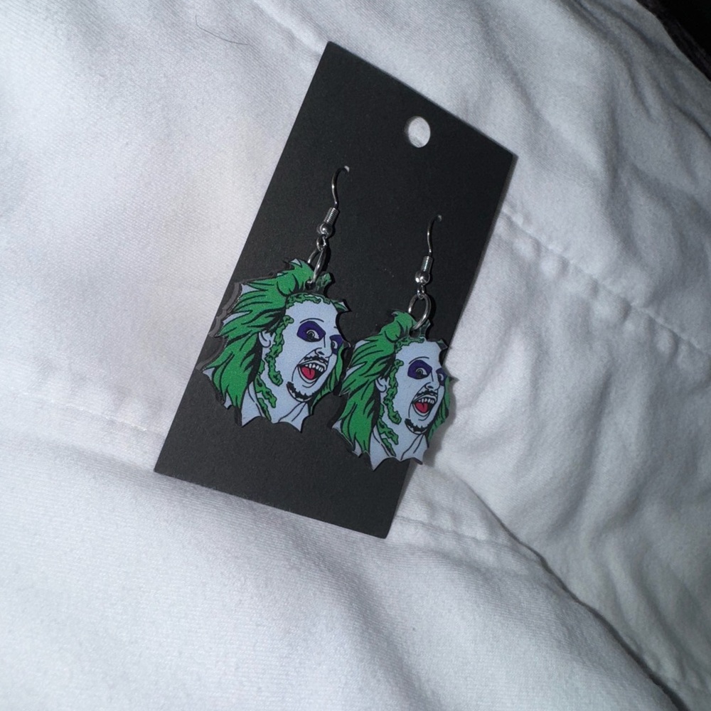 Green and Black Character Earrings